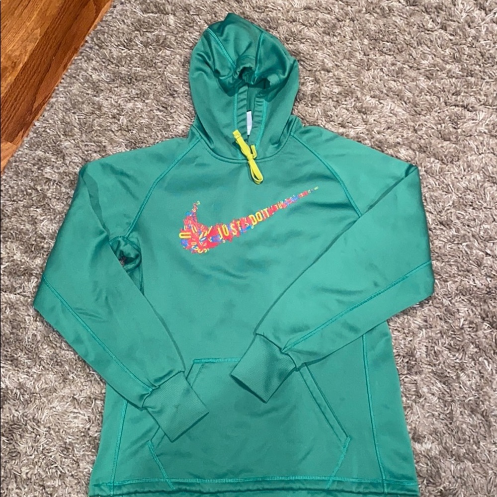 Green women’s Nike sweatshirt